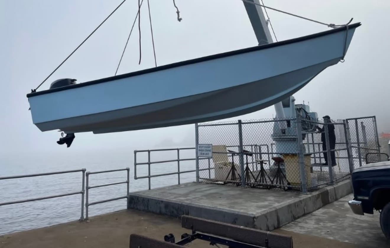 Del Mar boat being launched at the dock