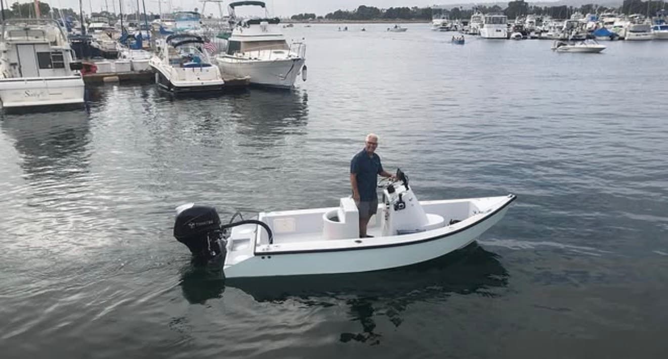 Del Mar skiff running on the water with a center console