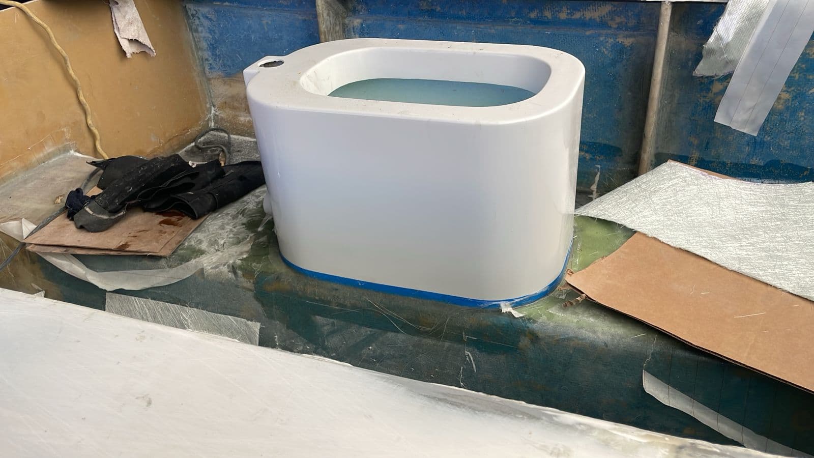 Custom bait tank filled with water during testing
